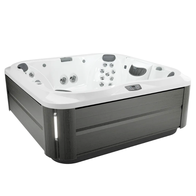 Elegant hot tub with gray wood-look siding and white interior. Perfect for relaxation. MacDonald Crane services can help with installation.